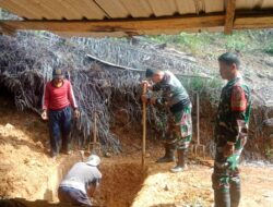 Warga dan Anggota Satgas TMMD ke 128 Kodim 0420/Sarko Turunkan Gorong-Gorong Untuk Akses Jalan Menuju Desa Seko Besar 